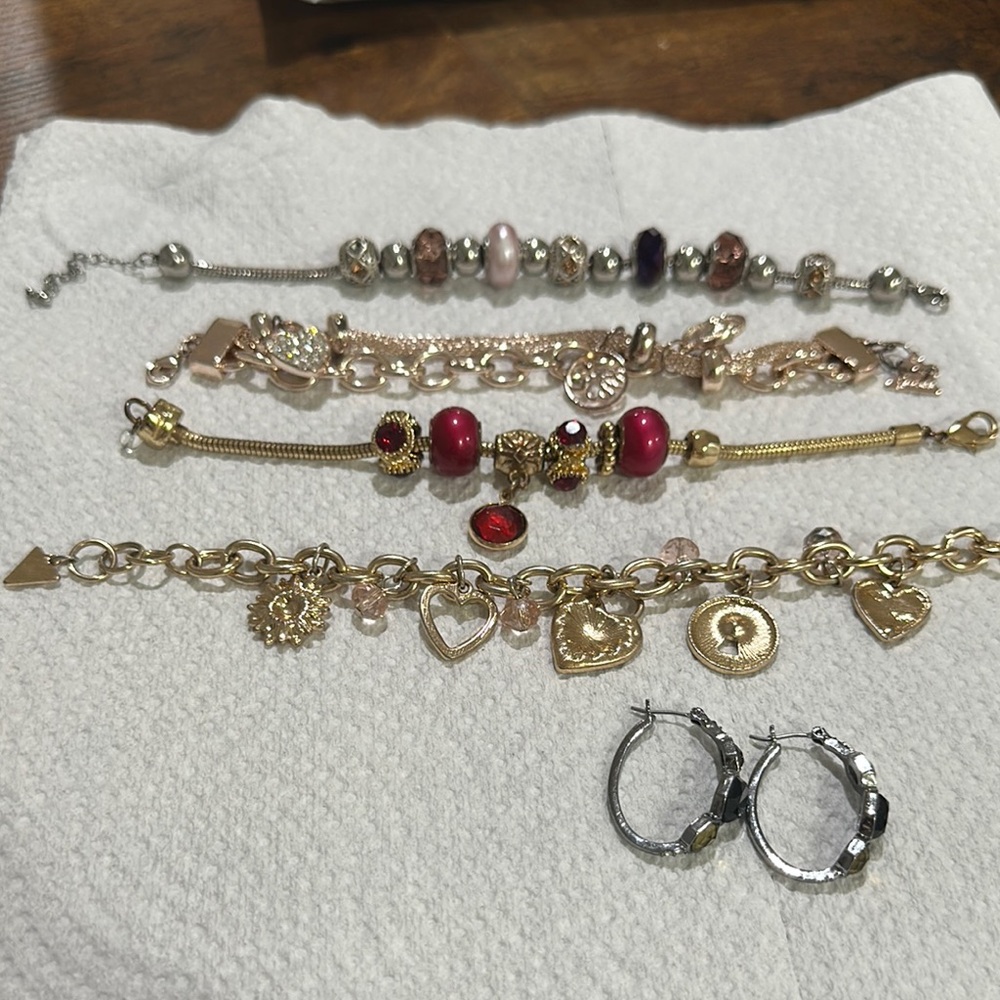 Delicate Gold and Silver Charm Bracelet with Red Gemstones